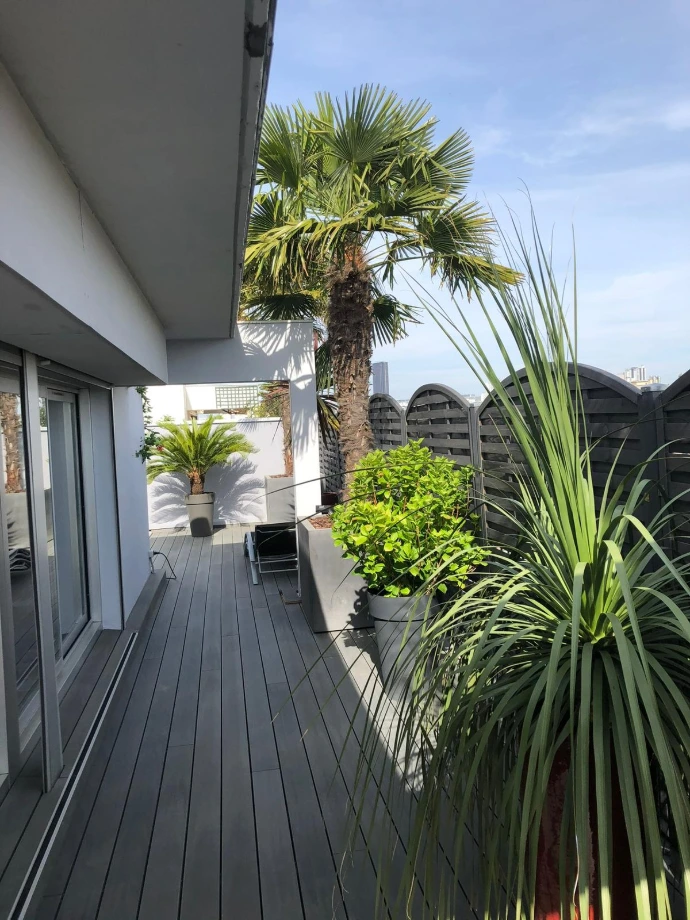Terrasse en bois exotique réalisée par Sol Tec en Île-de-France